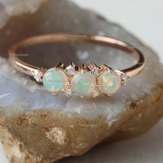 A beautiful & delicate Opal ring made in 14k or 18k gold, Solid 14k Gold Ring, Trio Opal Gemstone Ring, Natural Diamonds Ring, Birthstone Fine Jewelry.This is a perfect gift for mom, sister, friend, girlfriend and friend.Also available in Rose Gold, White Gold and Yellow Gold.Product info:14k solid goldGemstone : OpalStone Weight : 0.33 Ct ApproxSI Clarity Natural, DiamondsDiamonds Weight : 0.19 Ct ApproxRing Size : US 7Item will be resized and shipped within 10 days.ITEM Will BE SHIPPED : I 14k Gold Stackable Opal Promise Ring, 14k Gold Opal Promise Ring, 14k Gold Opal Promise Ring Fine Jewelry, 14k Gold Opal Ring For Anniversary, 14k Stamped Opal Promise Ring, 14k Gold Opal Ring With Accent Stones For Promise, Delicate 14k Gold Round Opal Ring, 14k Gold Opal Wedding Ring, 14k Gold Opal Wedding Ring Stamped 14k