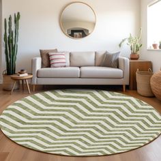 a living room filled with furniture and a round rug