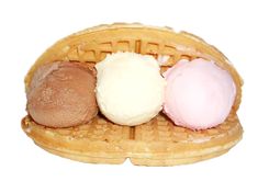 three scoops of ice cream in a waffle