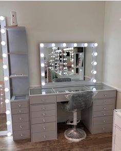 a vanity with lights on it in a room