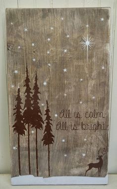 a wooden sign that says, all is calm and the stars are in the sky