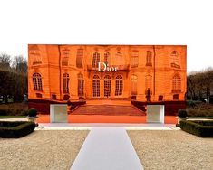 an orange building with the words dior on it