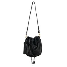 Our black leather bucket bag is a timeless classic with a modern twist. It comes with not one, but two detachable straps, so you can wear it your way. Choose between the long, luxurious black strap for a chic shoulder bag or opt for a short one, handwoven vibrant pink strap.  Additional Details  Material: Leather Color: Black Size: Medium Closure: Drawstring Hardware: Gold  Straps: Detachable Here are a few tips for storing your bag in the dust bag (include in your purchase): -Empty the bag of a Chic Bucket Bag With Leather Lining, Leather Bucket Bag For Everyday Luxury, Black Everyday Luxury Bucket Shoulder Bag, Soft Leather Evening Bucket Bag, Evening Soft Leather Bucket Bag, Chic Everyday Luxury Crossbody Bucket Bag, Luxury Everyday Black Bucket Bag, Evening Crossbody Bucket Bag With Leather Lining, Leather Bucket Bag With Removable Pouch For Everyday Luxury