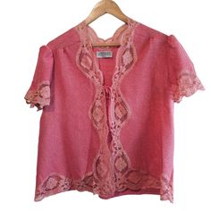 Vintage Lily of France Blouse Womens Size Large Pink Lace Y2K Top Short Sleeve Great condition! Color: Pink Design: Lace on edges  Sleeves: Short sleeve, with tie cardigan Casual, party, Y2K,  Measurements in photos. Same day / next day shipping  Offers accepted  Like for price drops and deals  Bundle 2 items or more and save! Thank you! 6oz NN Vintage Short Sleeve Lace Top For Summer, Pink Short Sleeve Blouse With Lace Trim, Vintage Lace Top With Short Sleeves For Summer, Short Sleeve Blouse With Lace Trim For Daywear, Vintage Short Sleeve Tops With Lace Trim, Vintage Lace Trim V-neck Blouse, Vintage V-neck Top For Daywear, Lace Y2k, Tie Cardigan