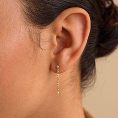 Introducing our stunning Dainty Diamond Drop Earrings—ideal for adding a touch of extra beauty and grace to any wedding attire. With alternating Marquise and Round diamond gemstones, these earrings are a perfect choice for bridesmaids or anyone looking to elevate their style for a special occasion! SKU: RR-ER445 Product Details Material: High Quality Solid 925 Sterling Silver Finish: 18K Gold ∙ Sterling Silver Featuring dainty ~28mm dangling Stud Earrings with ~1-2mm Round and ~3x1.5mm Marquise Delicate Teardrop Linear Earrings For Anniversary, Gold Linear Earrings With Prong Setting For Wedding, Dainty Diamond Drop Earrings For Anniversary, Minimalist Single Diamond Earring For Wedding, Dainty Diamond Accented Earrings For Anniversary, Dainty Diamond Accent Earrings For Anniversary, Delicate Prong Set Drop Earrings, Yellow Gold Diamond Linear Earrings For Wedding, Dainty Diamond-accented Earrings For Wedding