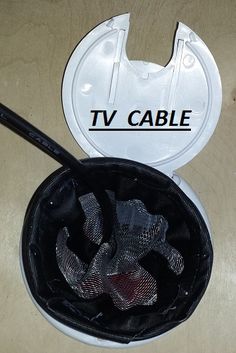 there is a tv cable in the bag on the table with it's lid open