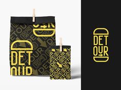 two bags with the words detour printed on them, one is black and yellow