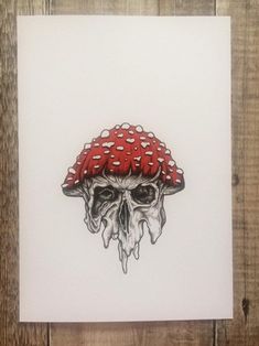 a drawing of a skull wearing a red hat with polka dots on it's head