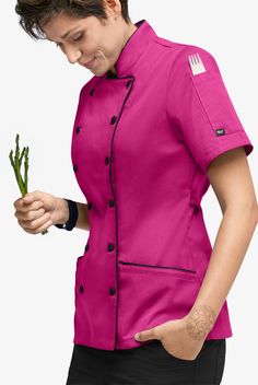 Women's modern fit short sleeve chef coat has back ties for an adjustable fit. Two front pockets carry your belongings while the double pocket on the left sleeve holds your thermometer or pens. Fabric covered buttons complete this look. Made of soft, easy care 65/35 poly/cotton. Approximate length for size Medium is 27 ½". • Modern fit • Stand collar • Double breasted • Fabric covered button closure • Total of 3 pockets • 2 front slant pockets • 1 left sleeve pocket • Short sleeves • Back ties • Uniform Design Ideas, Chef Uniform Women, Chef Coats, Chef Uniforms, Bistro Apron, Chef Jackets, Chef Wear, Chef Uniform, Compression Wear