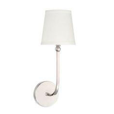 a white wall light with a white shade on the side and a small lamp attached to it