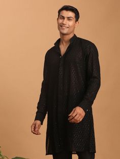 Colour: black Embellished  Mandarin collar Long, regular sleeves Straight shape with regular style Sequinned detail Above knee with straight hem Machine weave regular georgette Size & Fit The model (height 6') is wearing a size M Material & Care Georg Long Sleeve Sequined Sets For Eid, Long Sleeve Bandhgala For Diwali Party, Eid Party Bandhgala Straight Kurta, Black Straight Kurta For Party, Long Sleeve Party Sets For Transitional Season, Black Kurta For Party, Black Dabka Kurta For Party, Black Long Sleeve Bandhgala With Chikankari Embroidery, Festive Black Semi-stitched Bandhgala