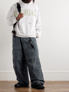 Balenciaga's cargo trousers are heavily faded and distressed to create an authentic vintage look. Cut for an exceptionally roomy fit, they're made from hard-wearing cotton-ripstop and have a drawstring waistband to adjust the fit. Mens Cargo Trousers, Cotton Cargo Pants, Wool Trousers, Mens Scarves, Suit Accessories, Cargo Pants Men, Casual Trousers, Cargo Trousers, Drawstring Waistband