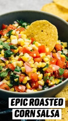 a bowl full of corn salsa with tortilla chips on the side and text overlay reading epic roasted corn salsa