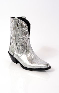 Turn some heads in these Western-inspired ankle boots, featured in a show-stopping metallic for an extra-fun touch. Features: Ankle length, pull-on design, Western-inspired style, leather fabrication, metallic finish, pointed toe, embroidered overlay details, dipped topline, pull straps, block heel Why We <3 It: The perfect eye-catching accent to add to your going-out look. Not your style? Shop a wide range of shoes at J&B! West Boots, Out West, Pewter Metal, Perfect Eyes, Love Is Free, Latest Fashion For Women, Handbag Accessories, Ankle Length, Clothes For Sale