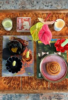 a wooden tray topped with different types of food