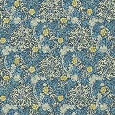 a blue and yellow wallpaper with flowers on it