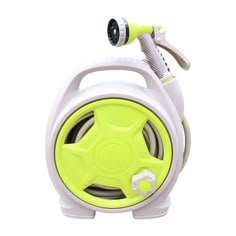 a green and white portable speaker with a light on it's headphone holder