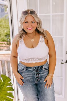 Plus Size - Add a flirty layer and additional coverage to any look with our femme white 'Love In Lace Bralette' featuring gorgeous lace detailing, a scooped neckline, wide shoulder straps with a deep v-cut neckline, and a flattering silhouette that ends in a straight hemline! This bralette comes with removable padding. Measurements XL variant has a Int Cup of A-D", a Int Width of 36-38". 2XL variant has a Int Cup of B-DD", a Int Width of 38-40". Feminine White Lace Tank Top, White Feminine Tank Top With Delicate Lace, Scooped Neckline, V Cut, V Cuts, Lace Bralette, Shoulder Straps, Bralette, Plus Size