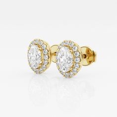 These imperial looking oval stud earrings are one of our best sellers. Large oval cut lab grown diamonds with a halo of round diamonds are a true amalgamation of style and glamor. Luxury Rose Gold Halo Design Earrings, Yellow Gold Oval Halo Earrings, Oval Halo Diamond Earrings In White Gold, Classic Oval Diamond Earrings With Halo Design, Oval Diamond Earrings With Vvs Clarity, Timeless Oval Halo Diamond Earrings, Oval Yellow Gold Diamond Earrings, Gia Certified Oval Diamond Earrings For Anniversary, Luxury Oval Diamond Earrings With Halo Design