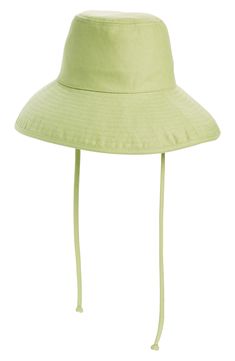 This vacation-ready bucket hat is designed with UPF 50+ sun protection and has a wide brim and sturdy chin straps that help keep the rays and wind at bay. Chin straps UPF 50+ sun protection Lined 100% cotton Spot clean Imported Summer Bucket Hat With Adjustable Fit And Flat Brim, Adjustable Fit Bucket Hat With Flat Brim For Summer, Adjustable Fit Flat Brim Bucket Hat For Summer, Spring Bucket Hat With Uv Protection And Adjustable Fit, Spring Adjustable Fit Bucket Hat, Adjustable Fit Spring Bucket Hat, Spring Vacation Bucket Hat With Adjustable Fit, Adjustable Solid Bucket Hat For Summer, Adjustable Brimmed Sun Hat For Spring