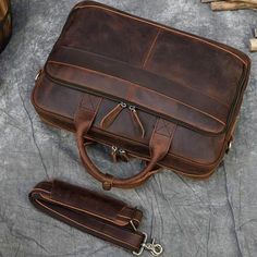 This 15.6" laptop leather briefcase for men is made of High quality Cowhide Grain Leather with Sturdy top handle and adjustable nice shoulder straps.     This leather laptop briefcase is made of high quality cowhide grain leather with traditional techniques.Our briefcase has sturdy top handle,adjustable nice shoulder straps makes you feel convenient in business trip or daily work.     ITEM FEATURES  - 1 x Main Compartment - 1 x Laptop Compartment - 1 x Interior Zipper Pocket - 1 x Front Zipper Pocket - Trolley Sleeve Design - Removable Shoulder Strap - Fit 15.6" Laptop - Genuine Leather & Durable   FREE SHIPPING & 10% OFF YOUR FIRST ORDER   🖐️Handmade 🎁FREE GIFT: crazy horse leather coin purse( original price: $22.99 )   ITEM DETAILS   *Item Type: Briefcase *Material: Crazy Horse Leather Leather Briefcase Bag, Briefcase Bag, Genuine Leather Handbags, Work Tote Bag, Pad Bag, Laptop Briefcase, Work Tote, Leather Laptop Bag, Handbags Casual