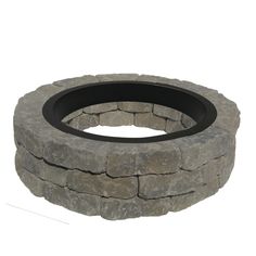 a stone fire pit with a black ring around it