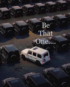 a white suv parked in a parking lot with the words be that one above it