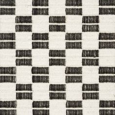 black and white checkered fabric with small squares in the center, as if it were woven