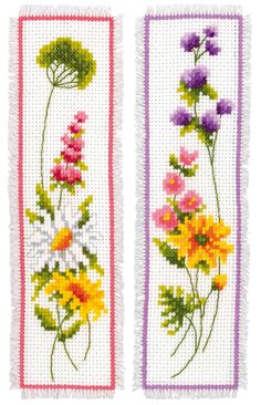 two cross stitch bookmarks with flowers on them