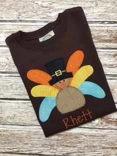 This 'pilgrim' turkey shirt is available in short or long sleeve. The shirts used are of great quality and not typical of those purchased at the 'big box' stores. For the appliques, I also use quality fabrics and the underside of the design is finished with a soft lining. NO shirt leaves my shop without this! You can also add a name if you would like. It will be stitched as pictured in the listing sample. Before you checkout, you will be able to provide the name if you so desire. All items in my Boys Thanksgiving Shirts, Boys Summer Shirts, Turkey Shirts, Gingham Shorts, Boys Tops, Thanksgiving Shirt, Red Gingham, Thanksgiving Shirts, How To Make Shorts