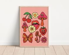 a pink poster with various images of mushrooms and flowers on the wall next to a wooden floor