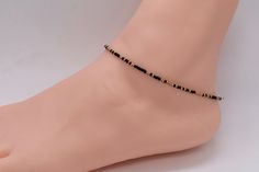 .  Beach Anklet, Beaded Anklet, Anklet Jewelry, Ankle Bracelet, Boho Anklet, Hippie Anklet, Gift For Her, Women's, Black Anklet, Gold Anklet Dainty anklet is made with 11/0 Czech black and gold seed beads with 2mm silver filled beads with a lobster clasp.  All items in my store are made buy me. Please send me a message if you want a custom order or need a size that is not listed in the drop down menu.  Size: Measure your anklet above the anklet bone with measuring tape. With that measurement add Black Beaded Anklets For Festival, Black Beaded Festival Anklets, Elegant Black Beaded Anklets, Adjustable Black Ankle Strap Anklets, Adjustable Black Anklet With Tiny Beads, Elegant Adjustable Anklet With Tiny Beads, Adjustable Black Ankle Wrap Anklets, Beaded Anklets With Ankle Strap As Gift, Beaded Anklets With Ankle Strap For Gifts