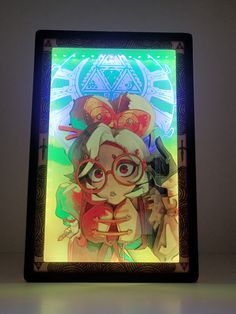 a lit up box with an anime character on it