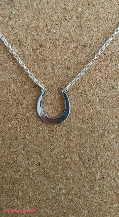 The horse silver pendant. Beautiful lucky horseshoe made in genuine 925 sterling silver.Lovely charm horseshoe ideal gift for wedding,bridesmaid gift or anyone who love horse. This silver charm can be personalized please do messages me. The horseshoe charm is 15 mm in size (1.5 cm) attached on 18 inches sterling silver chain. You will received the pendant in a gift boxed. Matching Earrings https://www.etsy.com/listing/211870097/horse-shoes-stud-earrings-lucky-horse?ref=shop_home_active_4 Fish Jewelry Silver, Precious Metal Clay Jewelry, Pumpkin Jewelry, Silver Pumpkins, Silver Flower Necklace, Horseshoe Necklace, Equestrian Jewelry, Horse Jewelry, Lucky Horseshoe