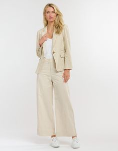 DESCRIPTION Elevate your wardrobe with the Portofino Linen Blazer in Natural by 365 Days Clothing. This versatile blazer seamlessly blends classic tailoring with the comfort of breathable linen. It features notched lapels, a single-button closure, and front flap pockets, offering a refined and practical addition to your collection. The natural linen fabric provides a relaxed yet polished look, perfect for any season and occasion. Pair the Portofino Linen Blazer with a crisp white shirt and tailored pants for a sophisticated office look, or wear it with jeans and a simple tee for a chic weekend look. Add a statement necklace and loafers to complete your stylish outfit. Still browsing? Discover our full range of women's clothing. FEATURES & FIT Notched lapels Single-button closure Front flap Linen Single Button Blazer For Office, Single Button Linen Blazer For Office, Office Linen Blazer With Pockets, Chic Linen Business Suits, Casual Linen Suits For Work, Linen Blazer With Welt Pockets For Work, Fall Single Button Linen Suit, Chic Linen Blazer With Hidden Button Closure, Semi-formal Linen Blazer With Notch Lapel