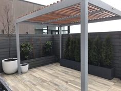 The Carpentry Shop Co. outdoor furniture Aluminum Frame Pergola with Ipe Purlins KIT Wood Pergola Design, Custom Pergola, Steel Pergola, Cedar Pergola, Retractable Roof, Fiberglass Planters, Outdoor Living Design, Aluminum Pergola, Stone Bench