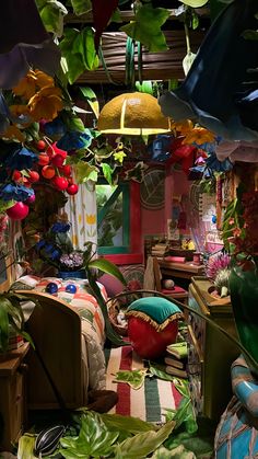 a room filled with lots of different types of plants and decorations hanging from the ceiling