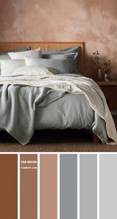 a bedroom with brown walls and grey bedding