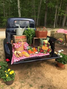 an old truck is loaded with fresh fruit and vegetables