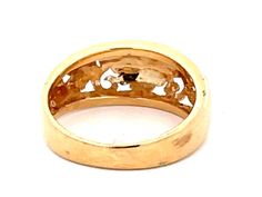 Ring Specifications:Designer: Ming'sMetal: 14k Yellow GoldTotal Weight: 2.9 GramsRing Size: 4.5 (resizable)Stamped: "Mings" "14K"Ring Width: 7.7 mmCondition: Preowned100% Authentic. Please ask all questions before bidding or making a best offer. International Bidders please contact us before bidding for shipping availability and charges.