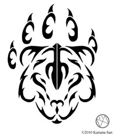 a tiger's head with claws on it is shown in the shape of a cross