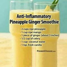 two glasses filled with pineapple ginger smoothie