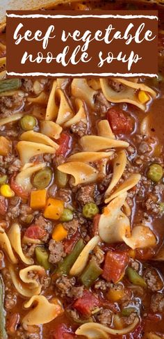 a wooden spoon filled with pasta and vegetables