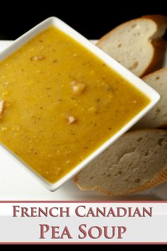 a white plate topped with bread and soup