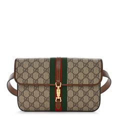 This is an authentic GUCCI GG Supreme Monogram Azalea Calfskin Web Jackie 1961 Belt Bag 80 32 in Beige, Ebony, and Brown Sugar. This belt bag is crafted of Gucci GG supreme monogram coated canvas. The bag features a green and red web stripe detail, gold hardware, a brown leather belt strap, and a flap with a magnetic closure that opens to a beige microfiber interior. Gucci Belt Bag, Gucci Coat, Red Web, Monogram Bag, Brown Leather Belt, Pocket Belt, Gucci Belt, Blue Bags, Gucci Jackie Bag