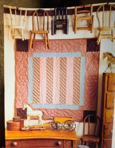 an old fashioned doll house with furniture and accessories