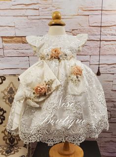 "★Ivory Christening Gown, Baptism Dress★ ★Occasion: Baptism, Child Blessing or any Special Occasion ★Comes With: Dress, Bonnet and Headband ★Measurements 3-6 Months, (Long 15\") (Waist 19\")  (Shoulder to Shoulder 8\") 12-18 Months, (Long 21\") (Waist 20\")  (Shoulder to Shoulder 8.5\") 2 Years, (Long 21.5\") (Waist 21\")  (Shoulder to Shoulder 9\") 3 Years, (Long 24\") (Waist 23\")  (Shoulder to Shoulder 9.5\") 4 Years, (Long 26\") (Waist 24\")  (Shoulder to Shoulder 10\") 6 Years, (Long 28\") (Waist 24.5\")  (Shoulder to Shoulder 10.25\") -Waist measurement is around ★Features: The back is open, for comfort when you load the baby (The waist is adjustable, has two ribbons to make a bow, as in the photo) Please check the measurements, and any questions send me a message,  your satisfaction Fitted Cream Gown For Pageant, Fitted Cream Gown For Pageants, Elegant Cream Gown For Pageant, Cream Lace Pageant Gown, Cream Lace Gown For Pageant, Cream Lace Baptism Dress For Pageant, Cream Baptism Dress For Ceremony, Fitted Cream First Communion Dress With Ruffles, Elegant Beige First Communion Dress