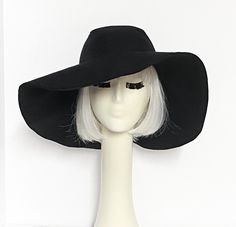 "Wide Brim sun hat made with black linen , lined in rayon print, the hat has a 2 section crown 3 1/2 \" in length and a one piece 5\" brim, a cotton band inside. One size fits most up to 23\" Machine wash cold / hand dry Made in USA Press if needed / packable" Solid Color Brimmed Felt Hat For Beach, Spring Outdoor Wide Brim Felt Hat, Black Brimmed Hat With Uv Protection, Spring Brimmed Felt Hat For Outdoor, Brimmed Felt Hat For Outdoor Spring Activities, Wide Brim Felt Hat For Vacation, Black Brimmed Travel Hat, Black Curved Brim Hat For Travel, Spring Outdoor Brimmed Felt Hat