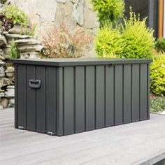 an outdoor storage box sitting on a deck