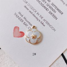 If you are from the European Union, please pay VAT, The order will be cancelled if no VAT is paid! 1.Quantity: 10pcs 2.Size: 17*20.5mm 3.Material: Alloy If you have any questions,please contact me. White Metal Jewelry With Flower Charm, White Metal Flower Shaped Jewelry, White Metal Flower-shaped Jewelry, White Dainty Pendant Charm, White Jewelry With Flower Pendant Charms, Small White Jewelry With Charms, Nickel-free White Enamel Charms, White Enamel Nickel-free Charms, White Heart-shaped Jewelry With Flower Charm